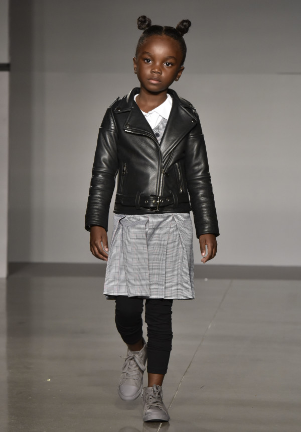 NEW YORK, NY - OCTOBER 17: A model, wearing designs from laer*, at petitePARADE / Kids Fashion Week, NYC October 2015 at Spring Studios on October 17, 2015 in New York City. (Photo by Eugene Gologursky/Getty Images for Petite Parade)