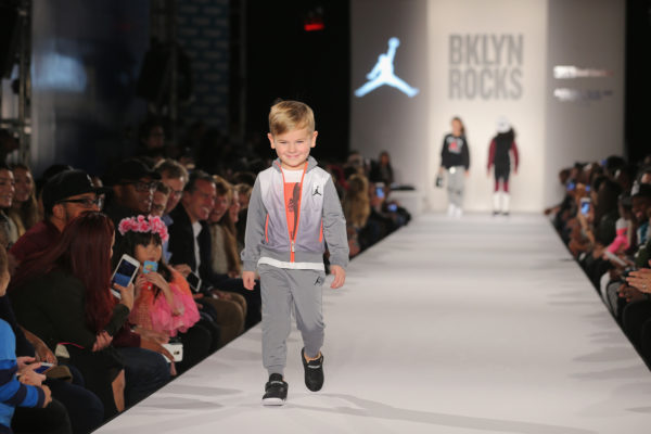BROOKLYN, NY - NOVEMBER 09: A model walks the runway at BKLYN Rocks presented by City Point, Kids Foot Locker, and Haddad Brands at City Point on November 9, 2016 in Brooklyn City. (Photo by Jemal Countess/Getty Images for City Point)